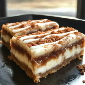 Ooey-Gooey Cinnamon Roll Cheesecake Bars